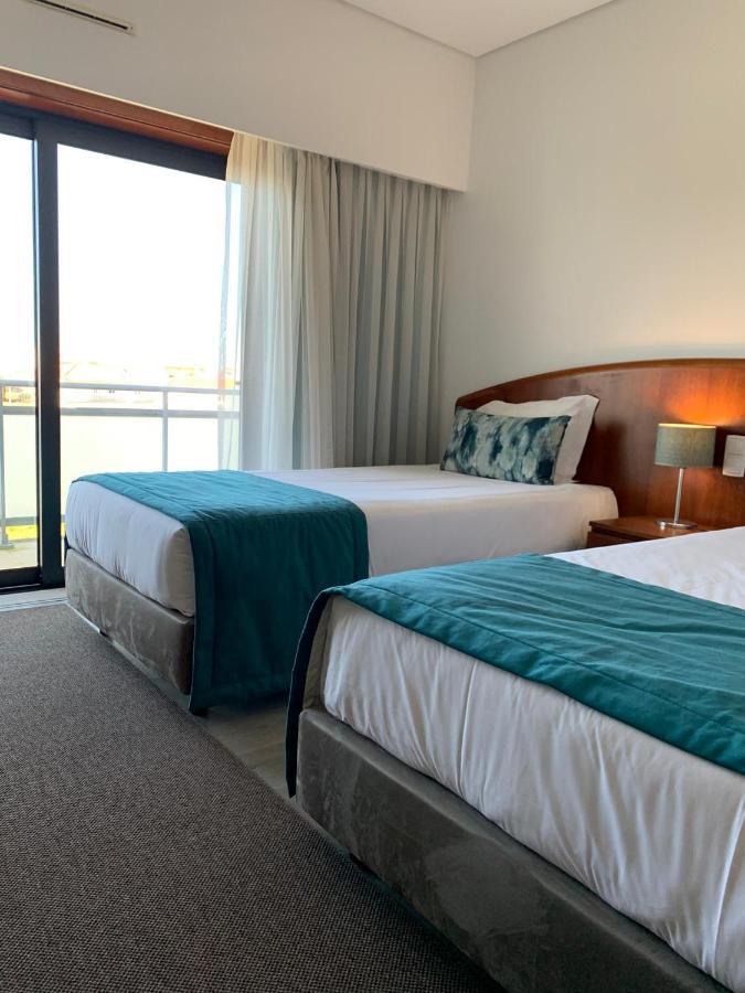 Apulia Praia Hotel เอสโปเซนเด ภายนอก รูปภาพ