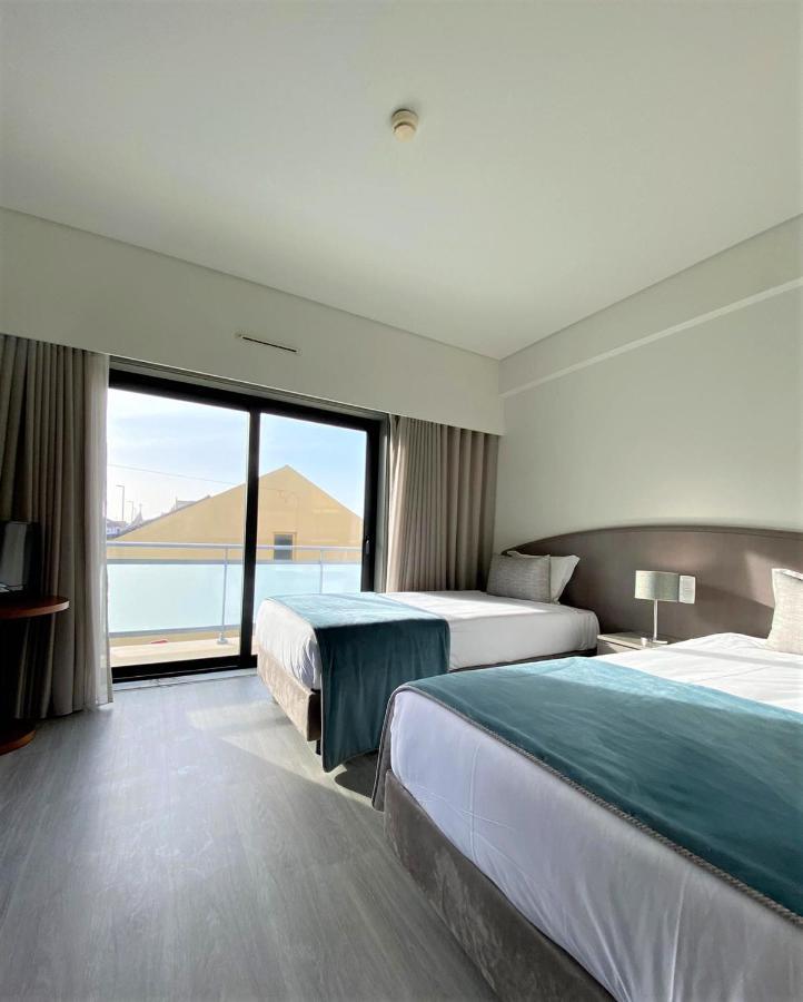 Apulia Praia Hotel เอสโปเซนเด ภายนอก รูปภาพ