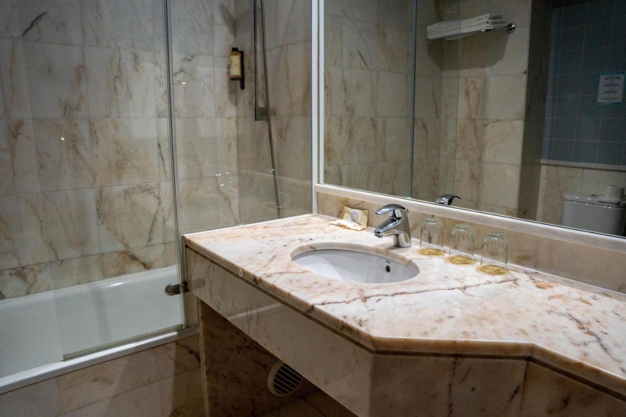 Apulia Praia Hotel เอสโปเซนเด ภายนอก รูปภาพ